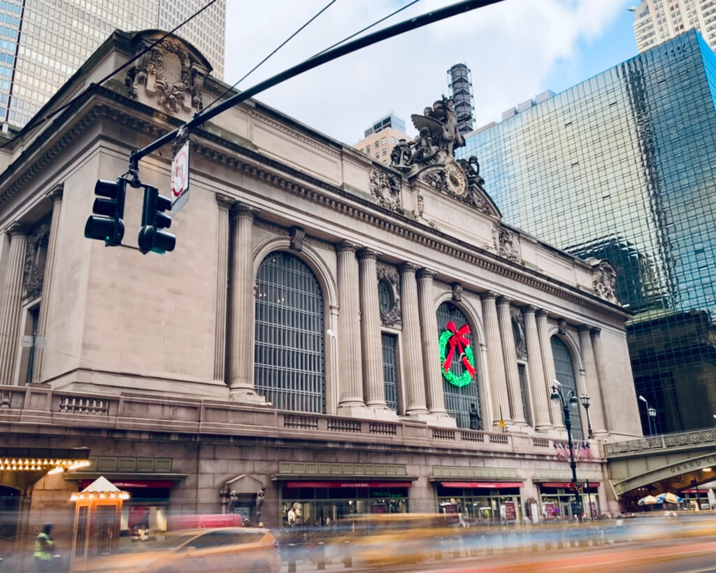 New York's train station with moving cars under