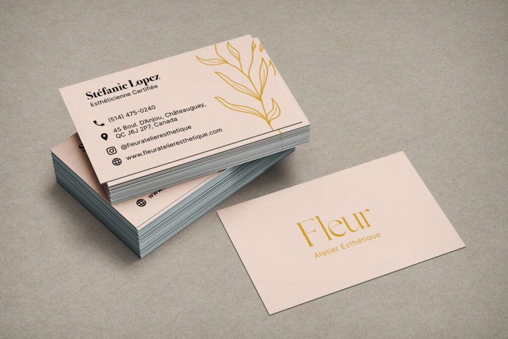 Mockup for a business card with gold leaf stamping and pink background