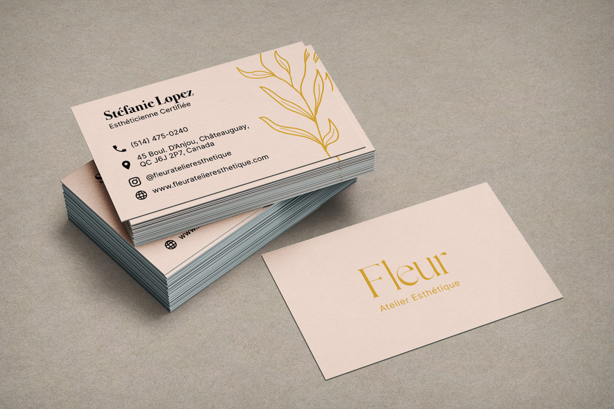 Mockup for a business card with gold leaf stamping and pink background