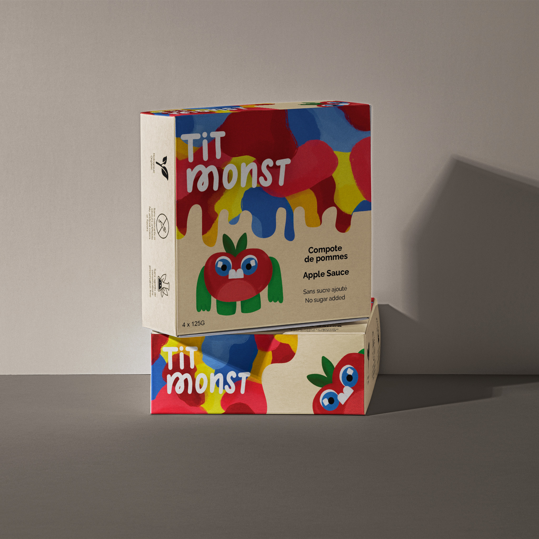 box mockup design of an apple sauce company with a monster and colourful and abstract illustration.